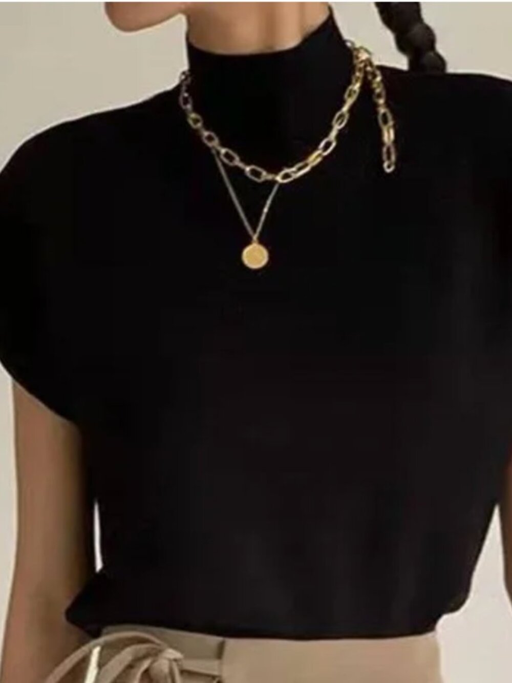 Black cap sleeve sweater
